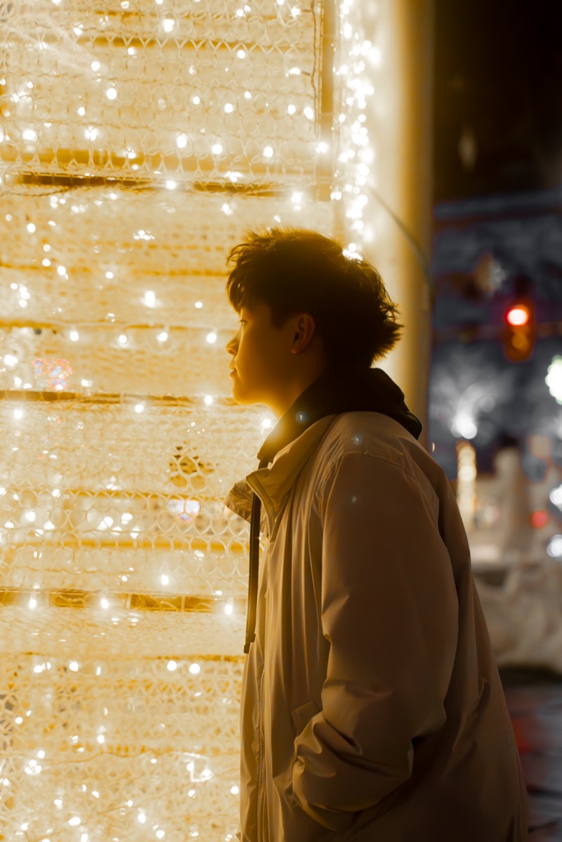 Silhouette against warm golden lights