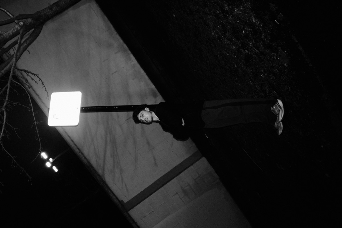 Silhouetted figure in a spotlight