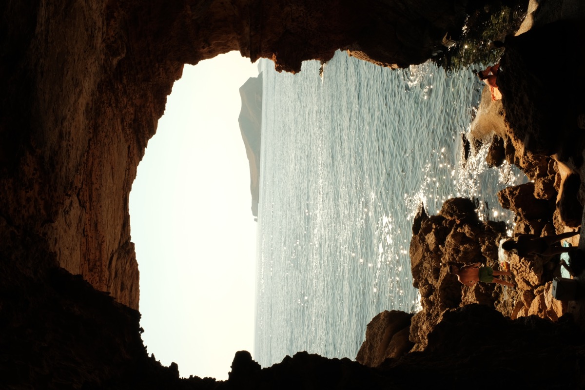 Vintage red vehicle under golden canopy