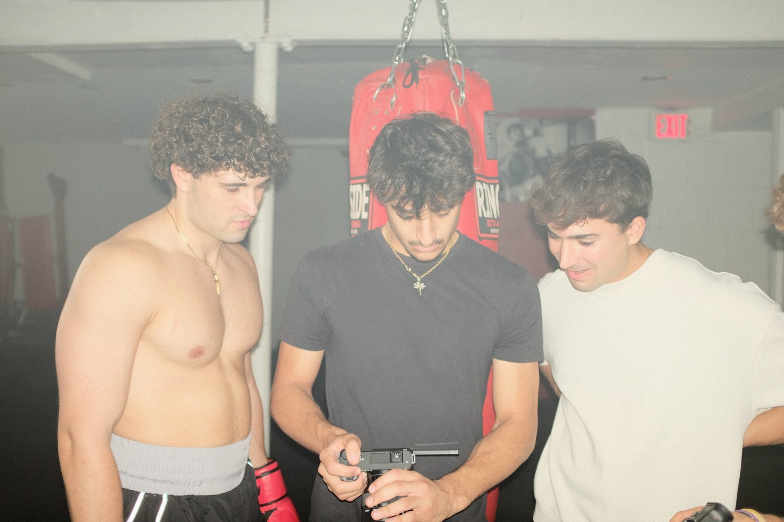 Gym scene with friends and training equipment