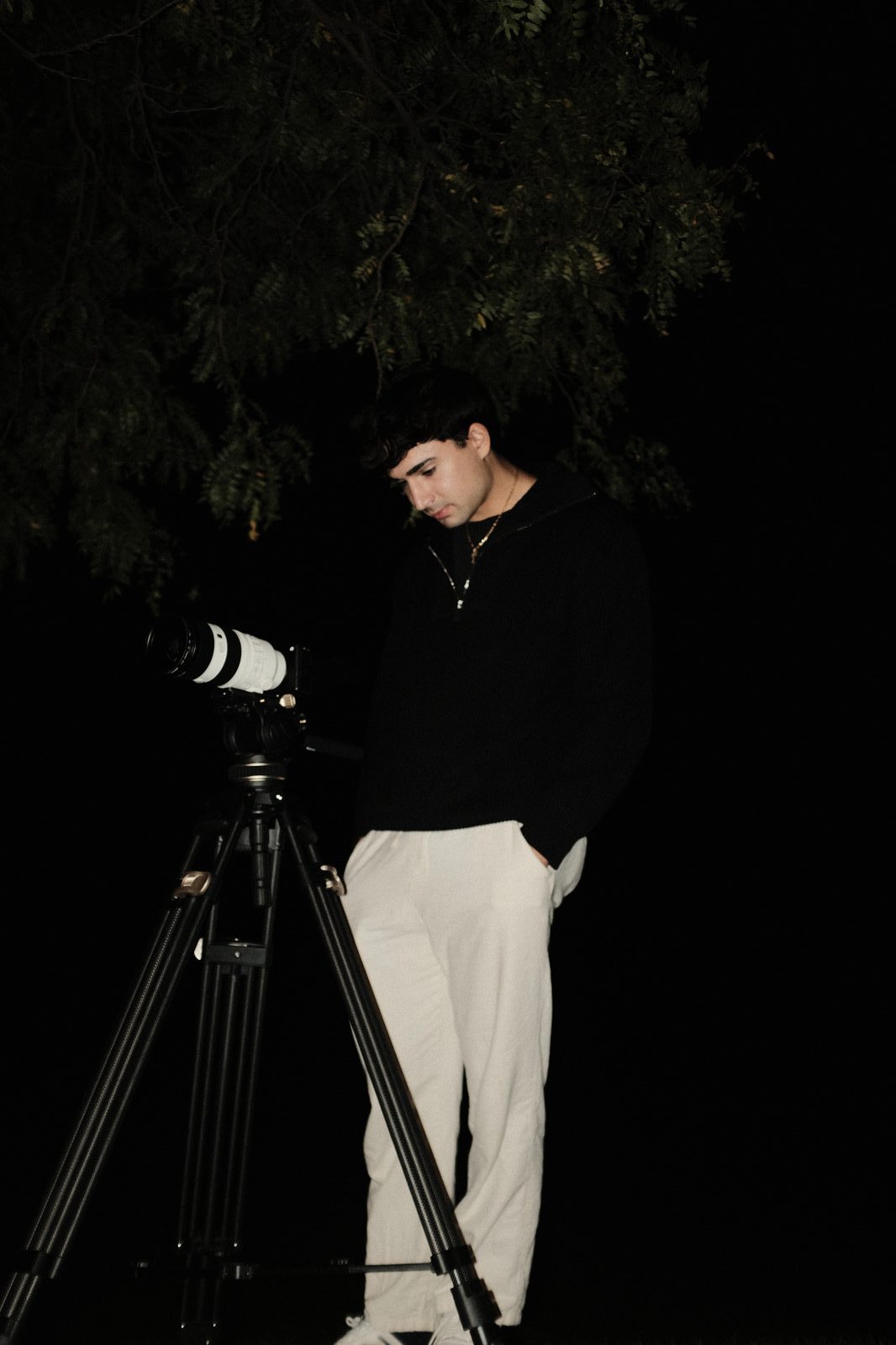 Night filming with camera rig under spotlight